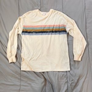 white long sleeve top with colored stripes